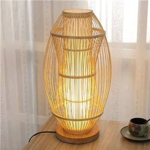 Elliptical shaped hanging bamboo lamp image 1
